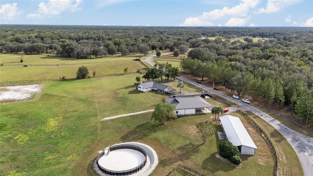 birds eye view of property with a rural view