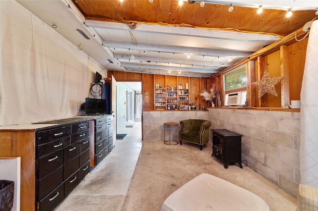 living area featuring wooden walls and cooling unit