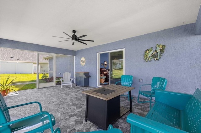 view of patio / terrace with ceiling fan