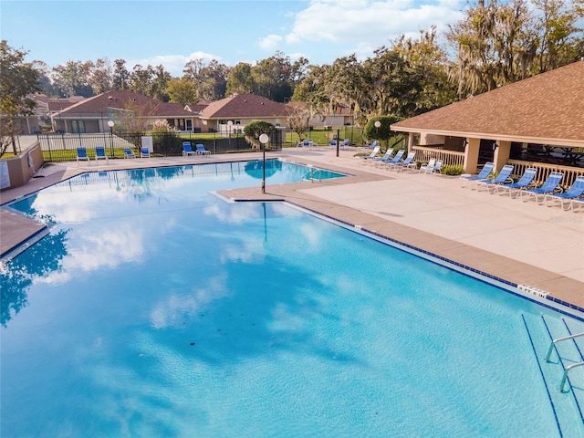 view of swimming pool featuring a patio area