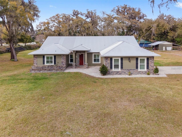 single story home with a front yard