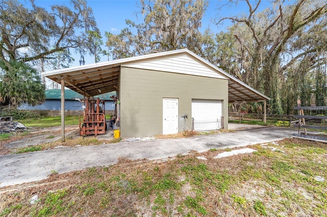 garage featuring a carport