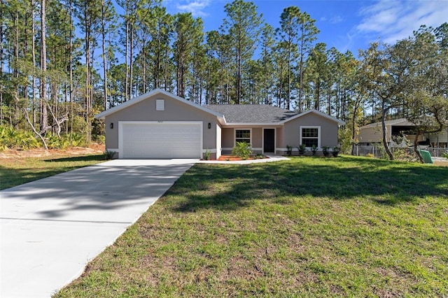 ranch-style house featuring a front yard and a garage