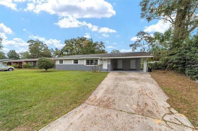 ranch-style home with a carport and a front yard