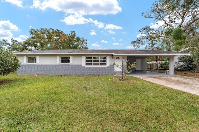 single story home with a front yard and a carport