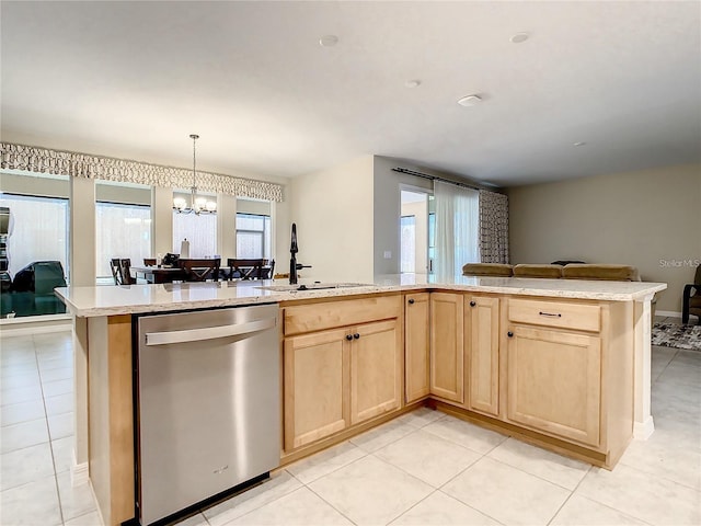 kitchen with light tile patterned flooring, a notable chandelier, light brown cabinets, sink, and stainless steel dishwasher