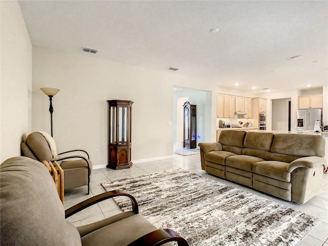 living room featuring light tile patterned flooring