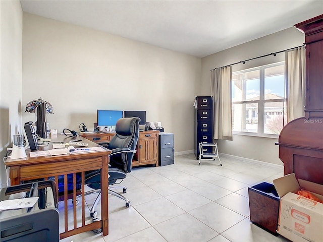 home office featuring light tile patterned flooring