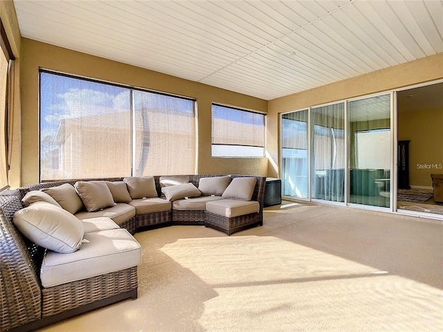 sunroom / solarium featuring plenty of natural light