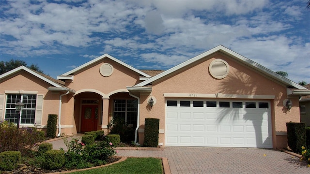 view of front of home with a garage