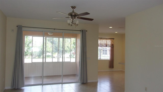 interior space featuring ceiling fan