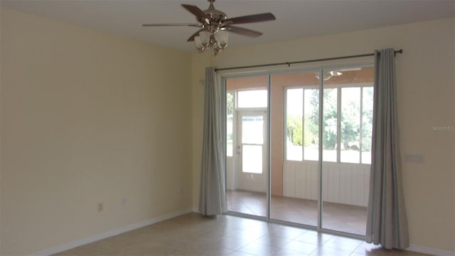 spare room with ceiling fan