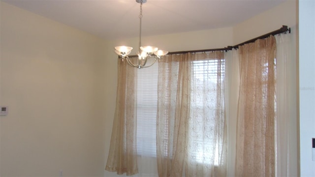 room details with an inviting chandelier