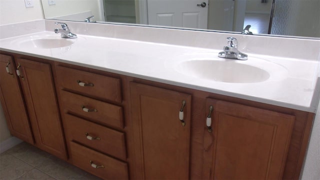 bathroom with vanity and tile patterned floors