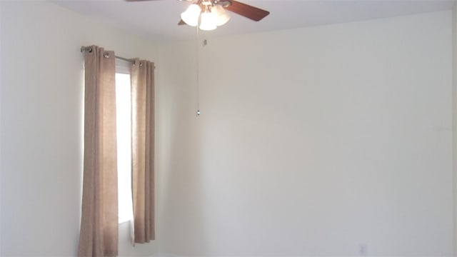 spare room featuring ceiling fan