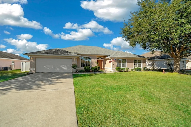 ranch-style house featuring central AC, a front yard, and a garage