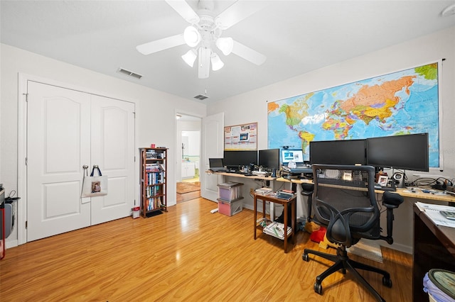 office area featuring ceiling fan and light wood-type flooring