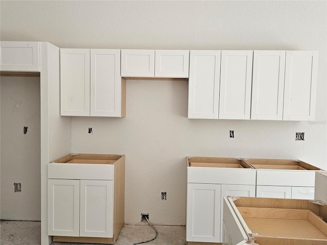 kitchen featuring white cabinets