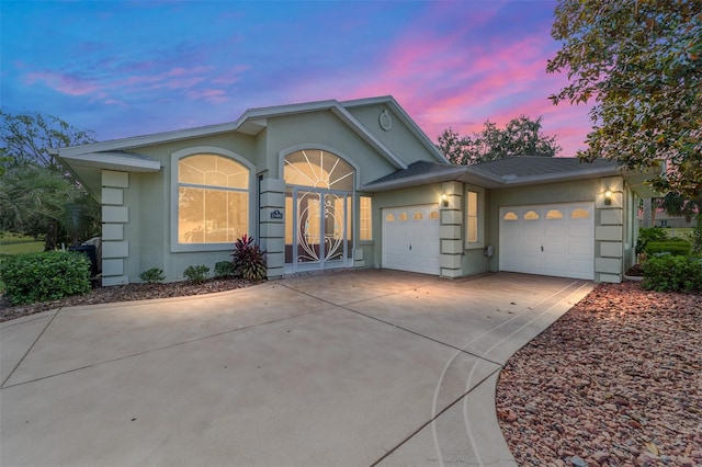 view of front of property featuring a garage