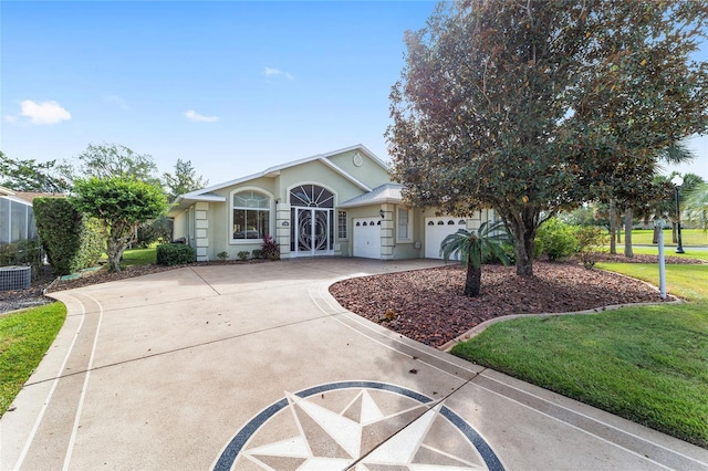 single story home featuring a garage, central AC unit, and a front lawn