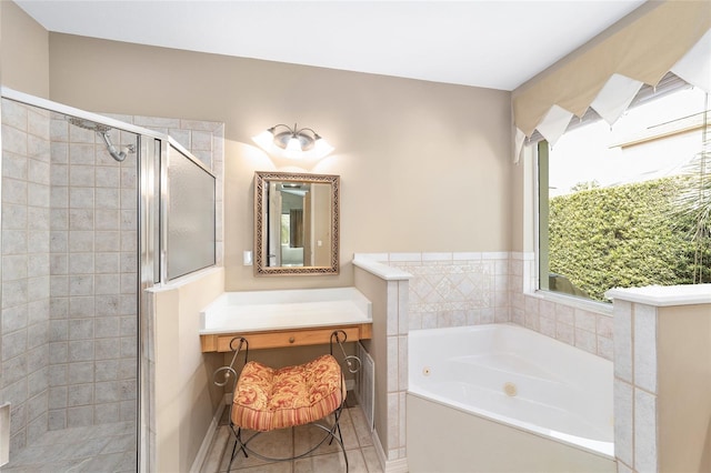 bathroom with vanity, tile patterned floors, and separate shower and tub