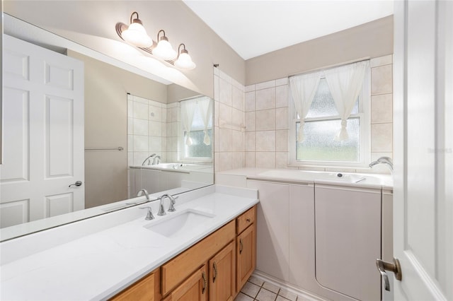 bathroom featuring vanity and tile patterned flooring