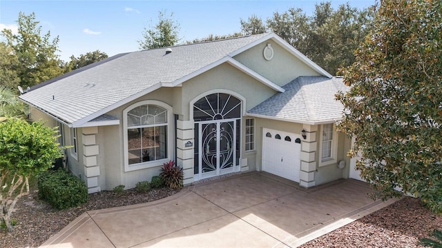 ranch-style home with a garage