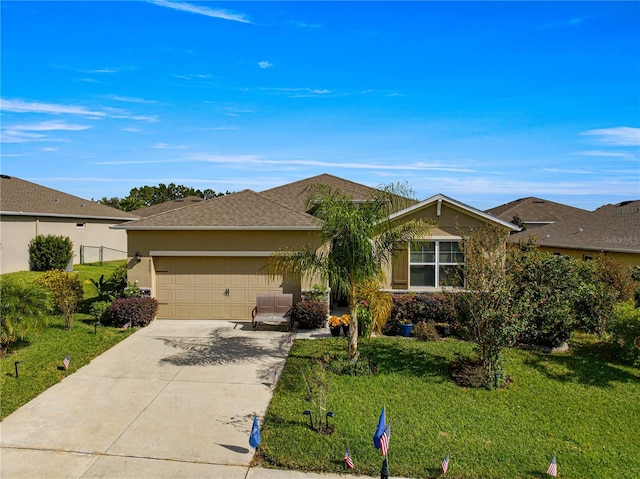 ranch-style house with a front yard and a garage