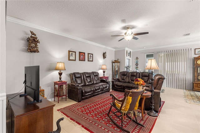 tiled living room featuring ornamental molding, a textured ceiling, and ceiling fan