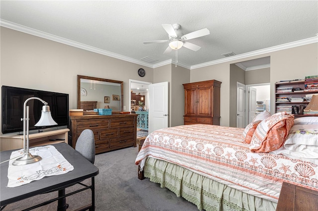 bedroom with ornamental molding, a textured ceiling, carpet floors, and ceiling fan