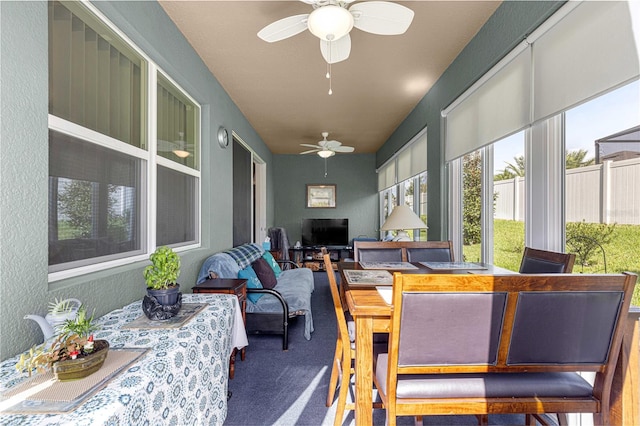 sunroom / solarium with ceiling fan