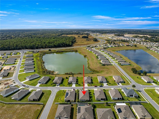 drone / aerial view featuring a water view