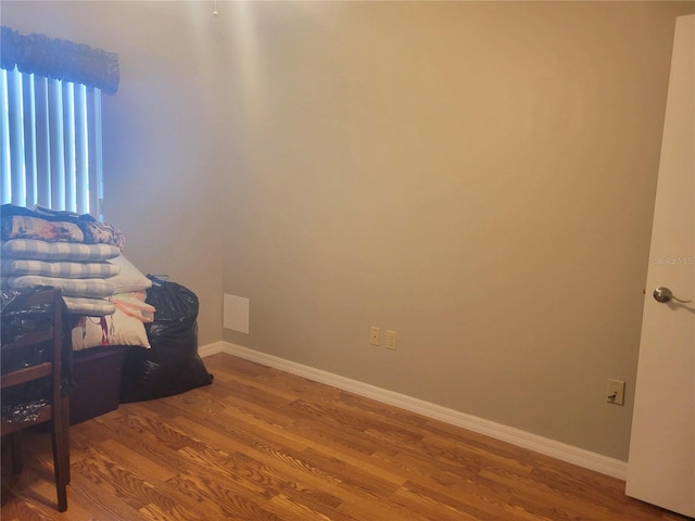 bedroom featuring hardwood / wood-style flooring