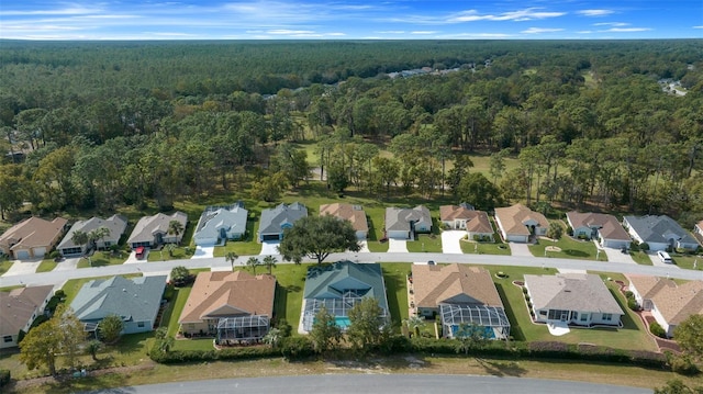 aerial view with a forest view and a residential view