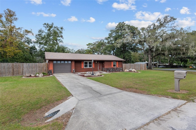 ranch-style home featuring a garage and a front yard