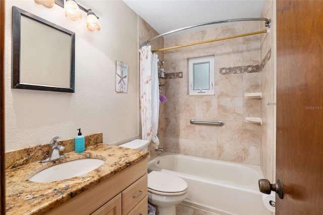 full bathroom featuring toilet, shower / tub combo, and vanity