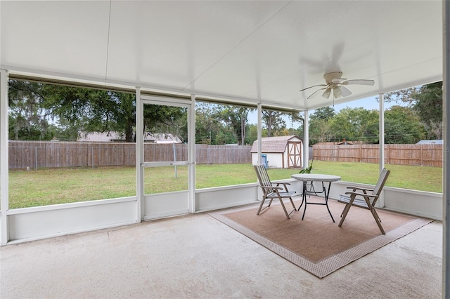 sunroom / solarium featuring a wealth of natural light and ceiling fan