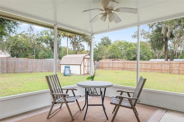 sunroom / solarium with ceiling fan and a healthy amount of sunlight