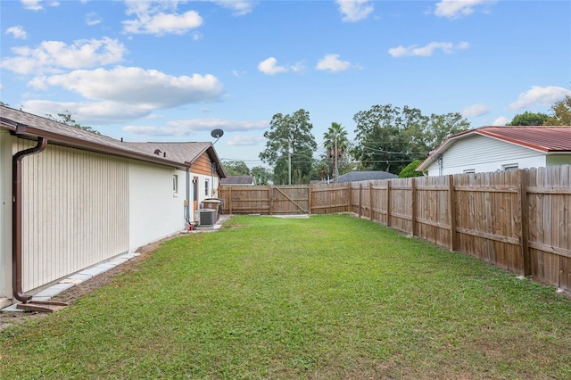 view of yard with central AC