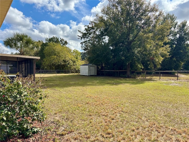 view of yard featuring a storage shed