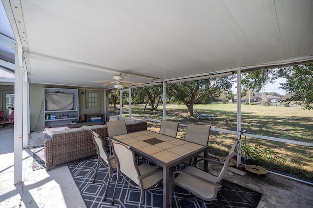 5537 SW 38th St, Ocala, FL 34474 - sunroom / solarium featuring a ceiling fan, outdoor dining area, and an outdoor living space