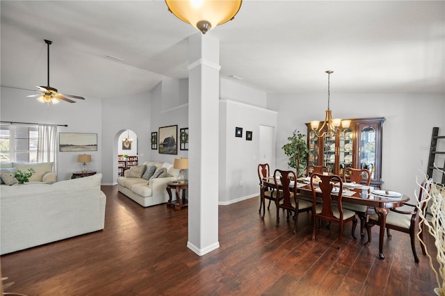 dining room featuring ceiling fan with notable chandelier, high vaulted ceiling, ornate columns, and dark hardwood / wood-style flooring