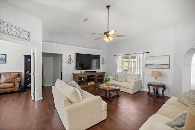 living room featuring dark hardwood / wood-style flooring, lofted ceiling, and ceiling fan