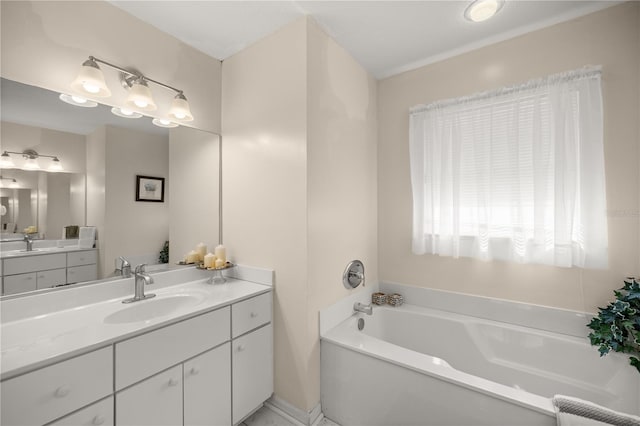 bathroom with vanity and a washtub