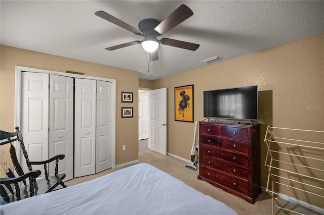 5537 SW 38th St, Ocala, FL 34474 - carpeted bedroom featuring a closet, baseboards, and ceiling fan