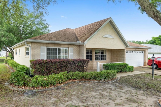 view of front of home featuring a garage