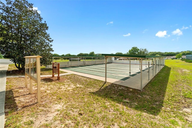 view of home's community with a yard and a rural view