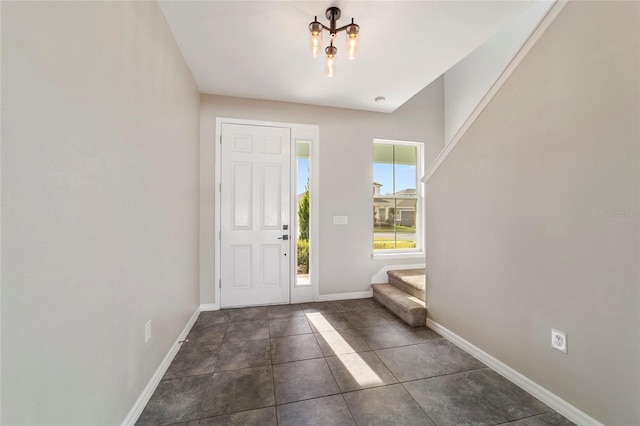 view of tiled foyer entrance