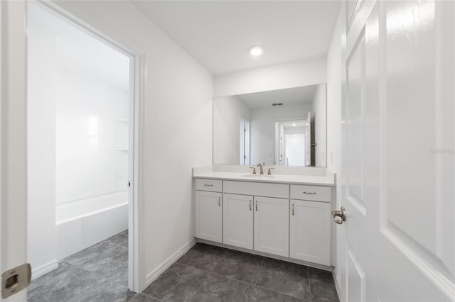 bathroom with vanity and shower / bath combination