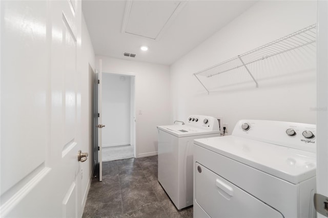 clothes washing area with independent washer and dryer